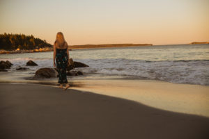 Walking on the beach at sunset