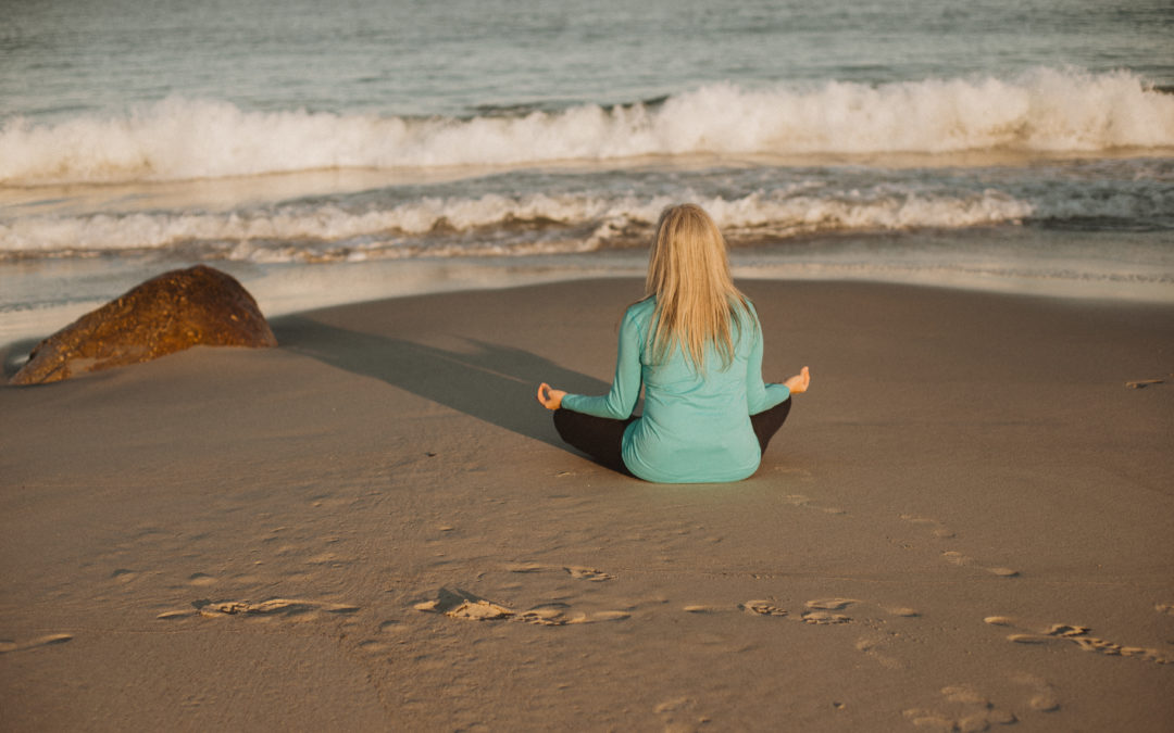 Meditating on the beach to reduce my anxiety and stress levels